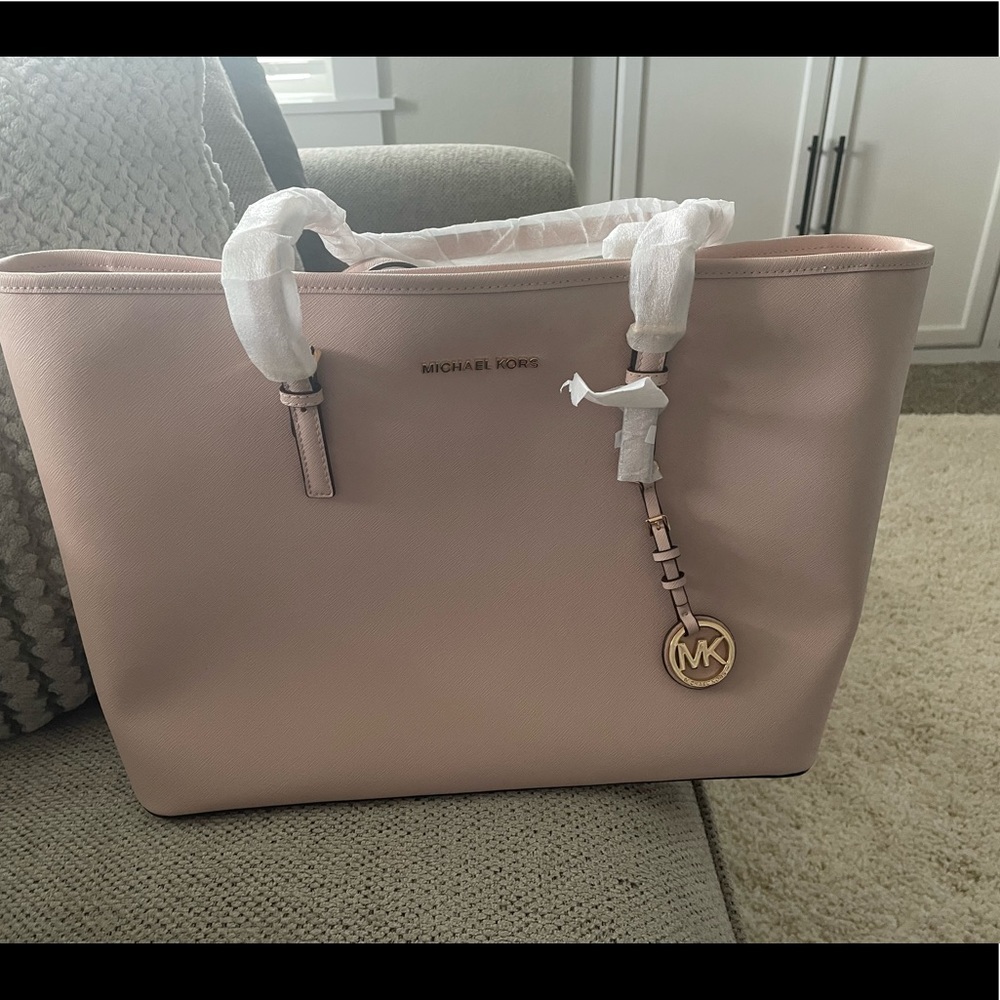 Michael Kors Soft pink travel tote . Large never used